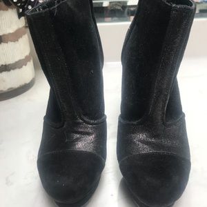 Black suede boots with metallic trim